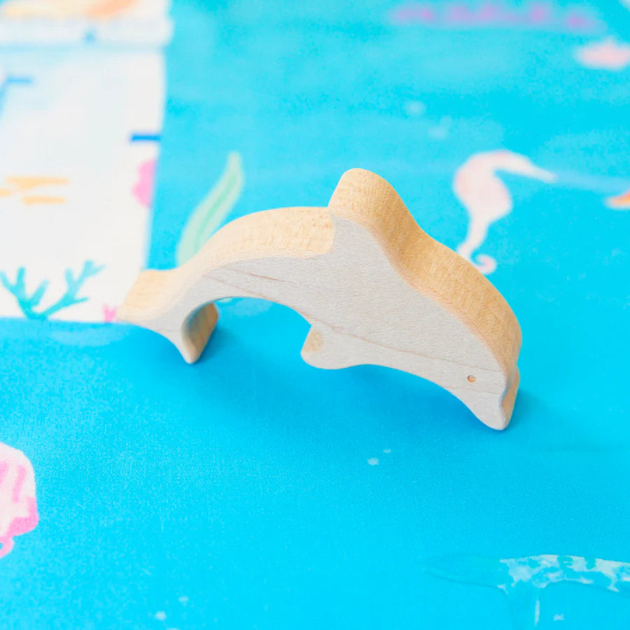 Delfin i tre